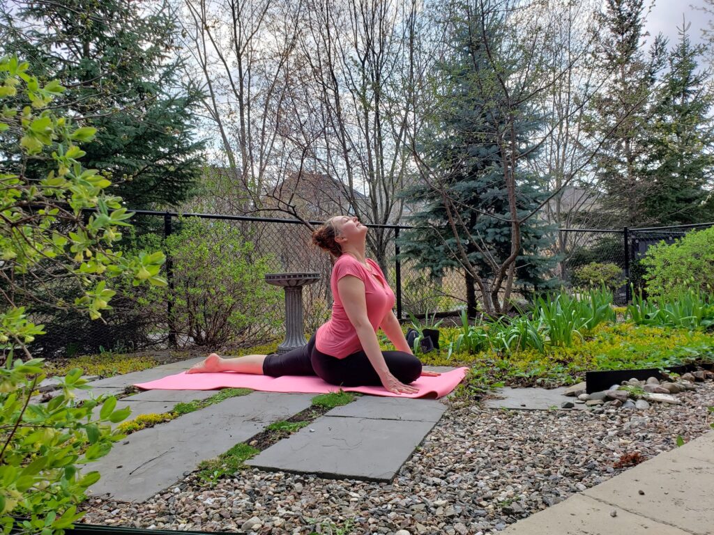 Yoga pose in yoga practice outdoors under the sun for strong body and mind creating a self-care routine, self-care, relaxing self-care