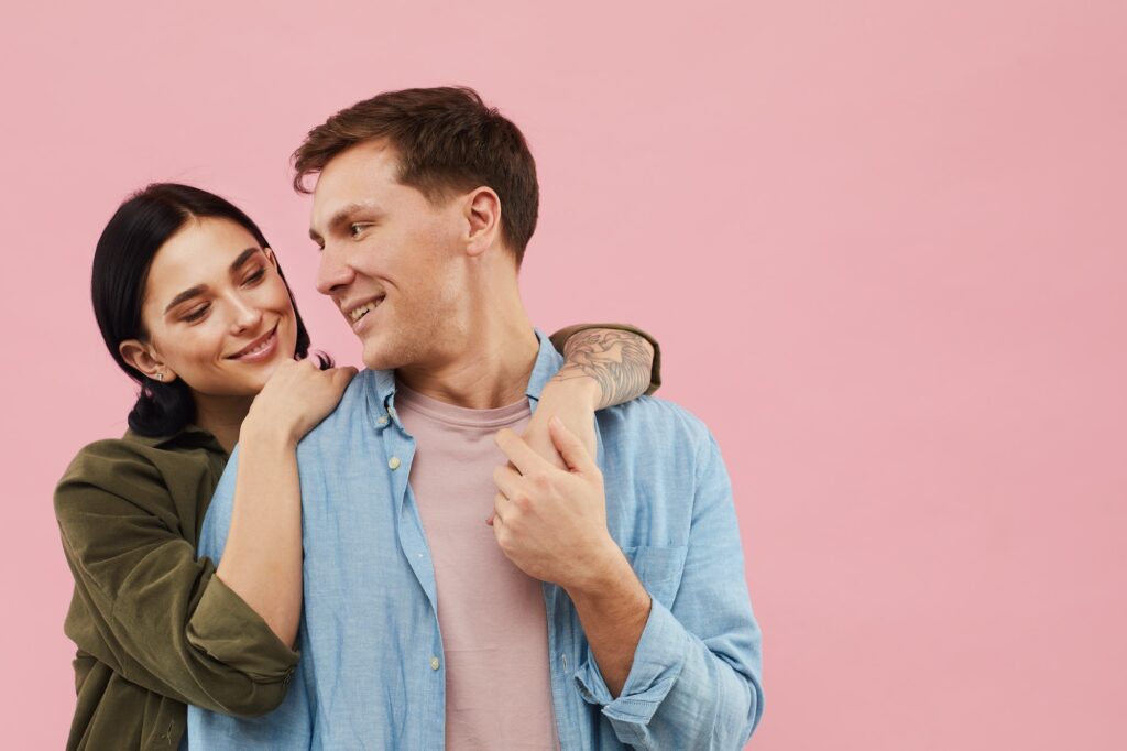 Couple Posing on Pink