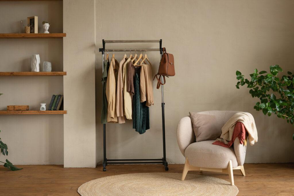 Rail rack with a capsule wardrobe in the living room