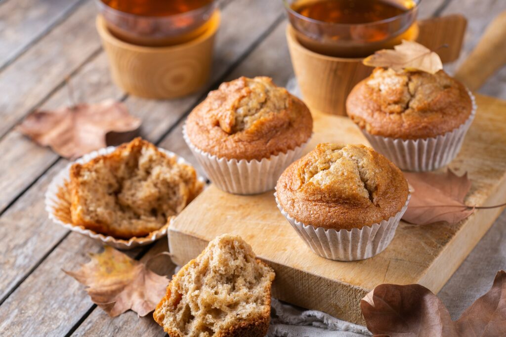 Homemade autumn cakes or muffins with nuts and spices